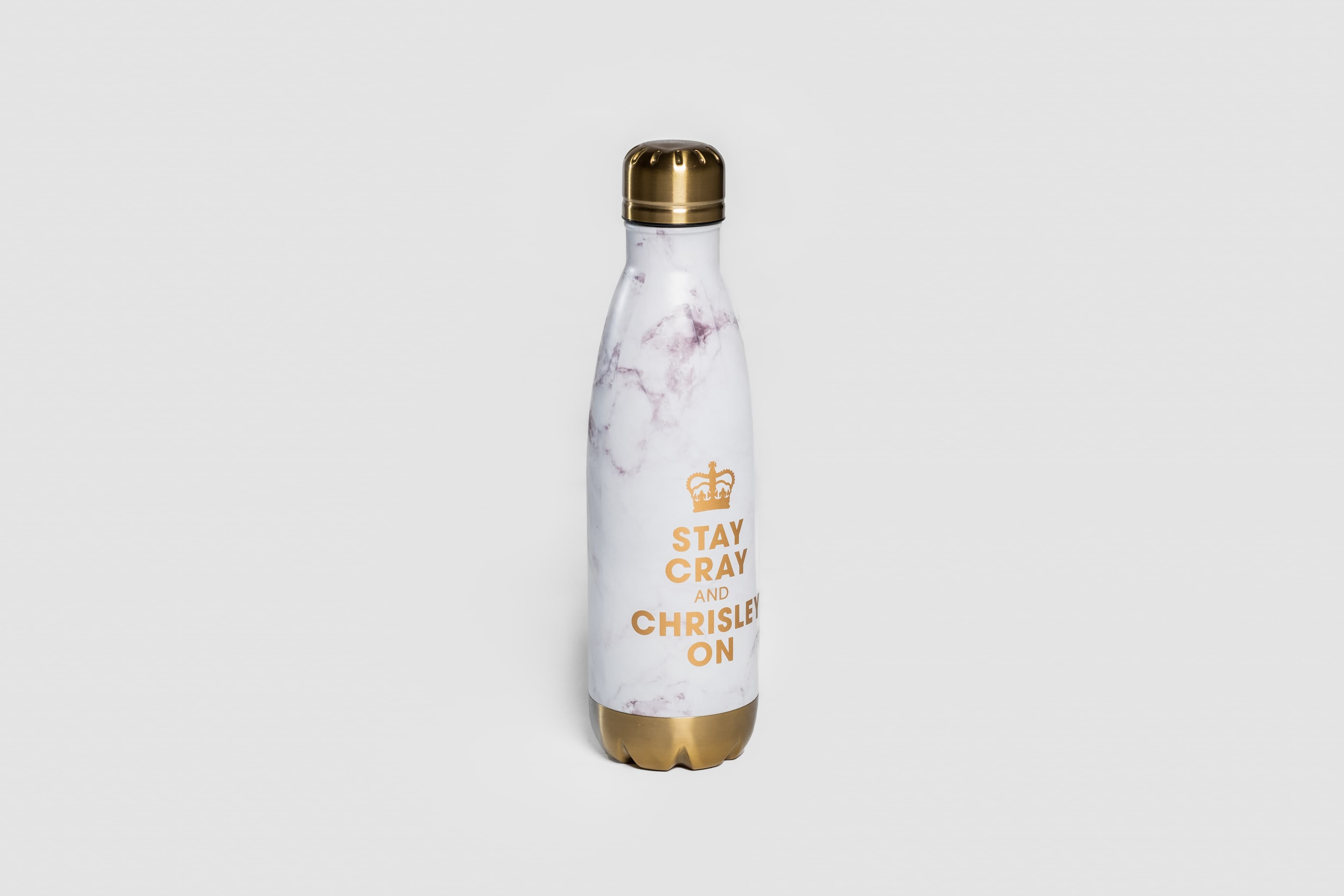 A front-facing photo of a 'Chrisley Knows Best' water bottle, taken at an angle