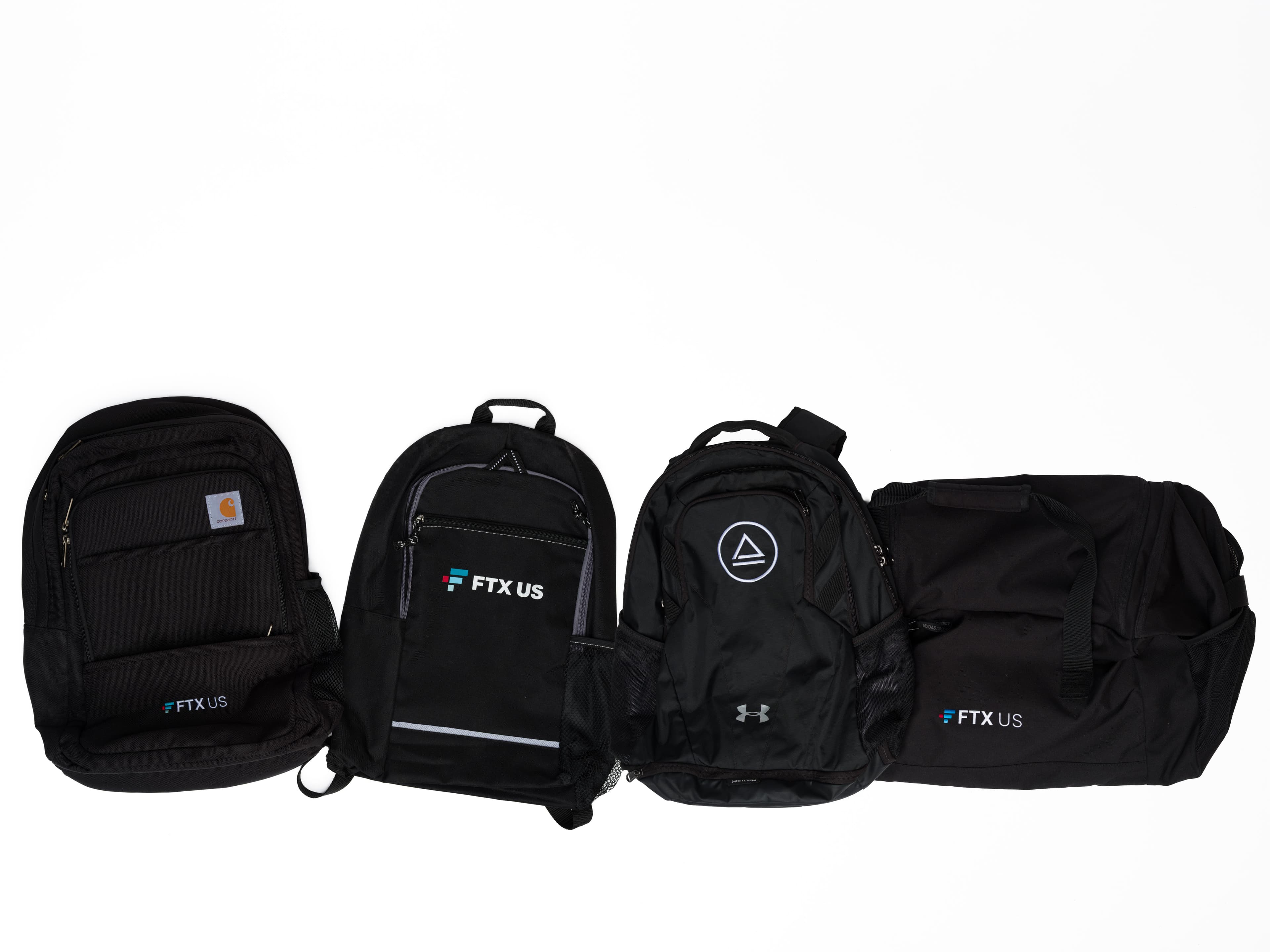 FTX-branded backpacks and duffel bag