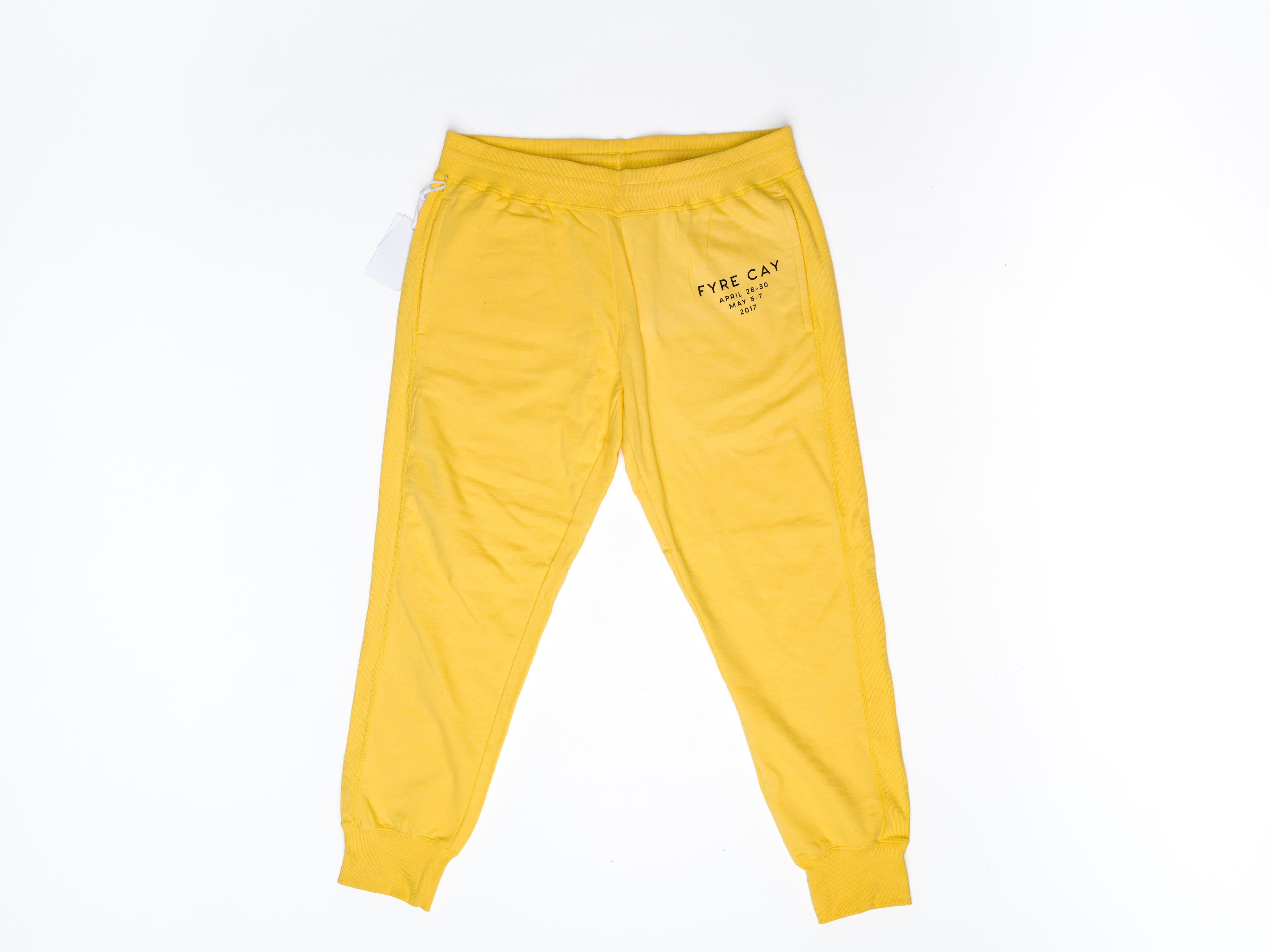 Folded pair of Fyre Fest sweatpants