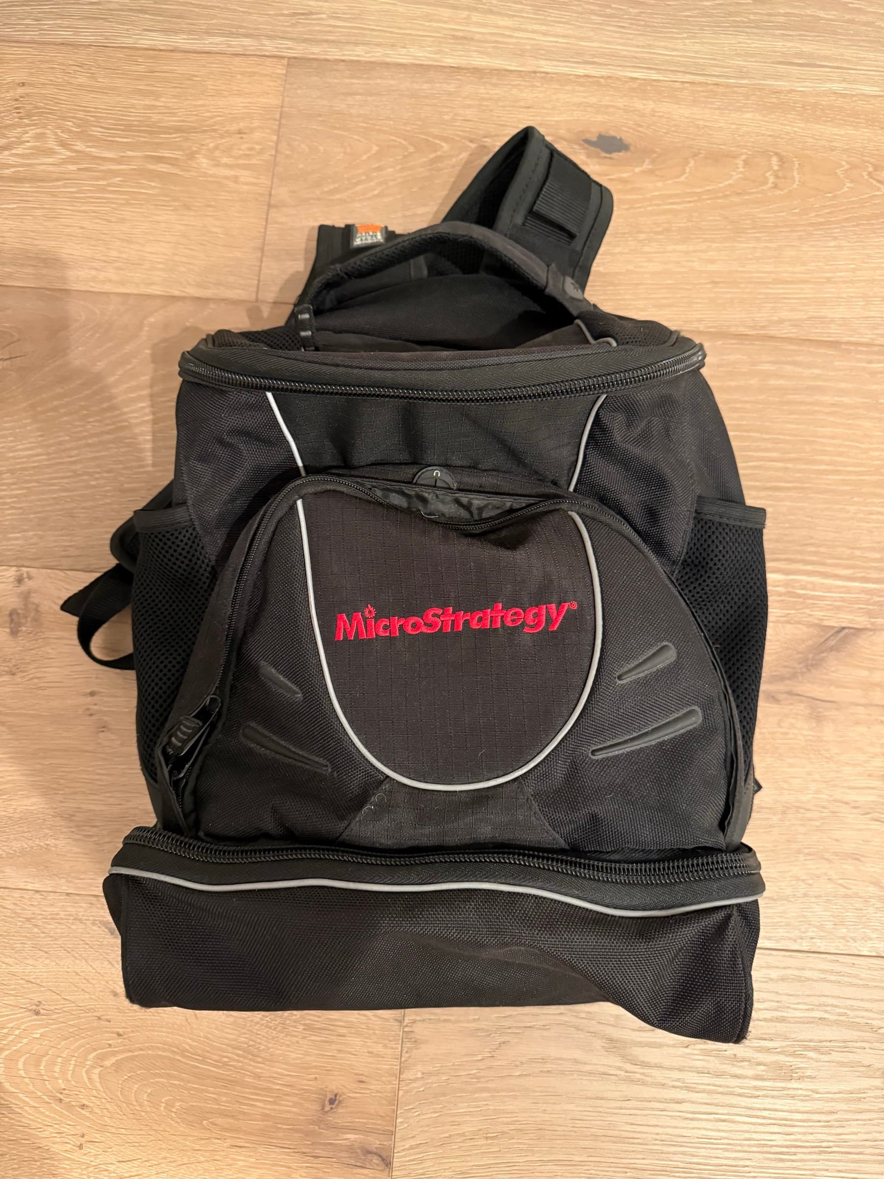 MicroStrategy-branded messenger bag viewed from above