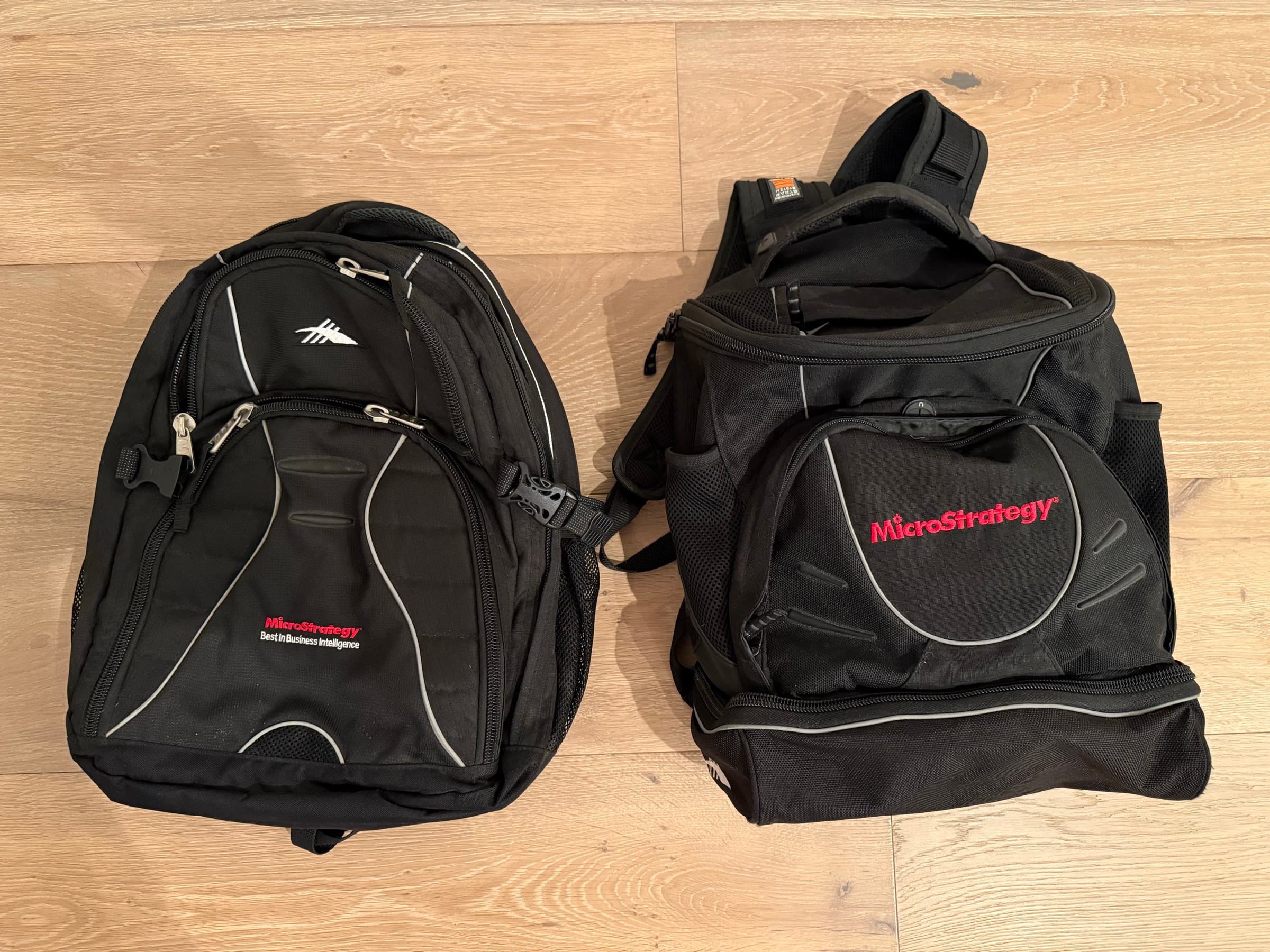 Two MicroStrategy-branded bags shown side by side