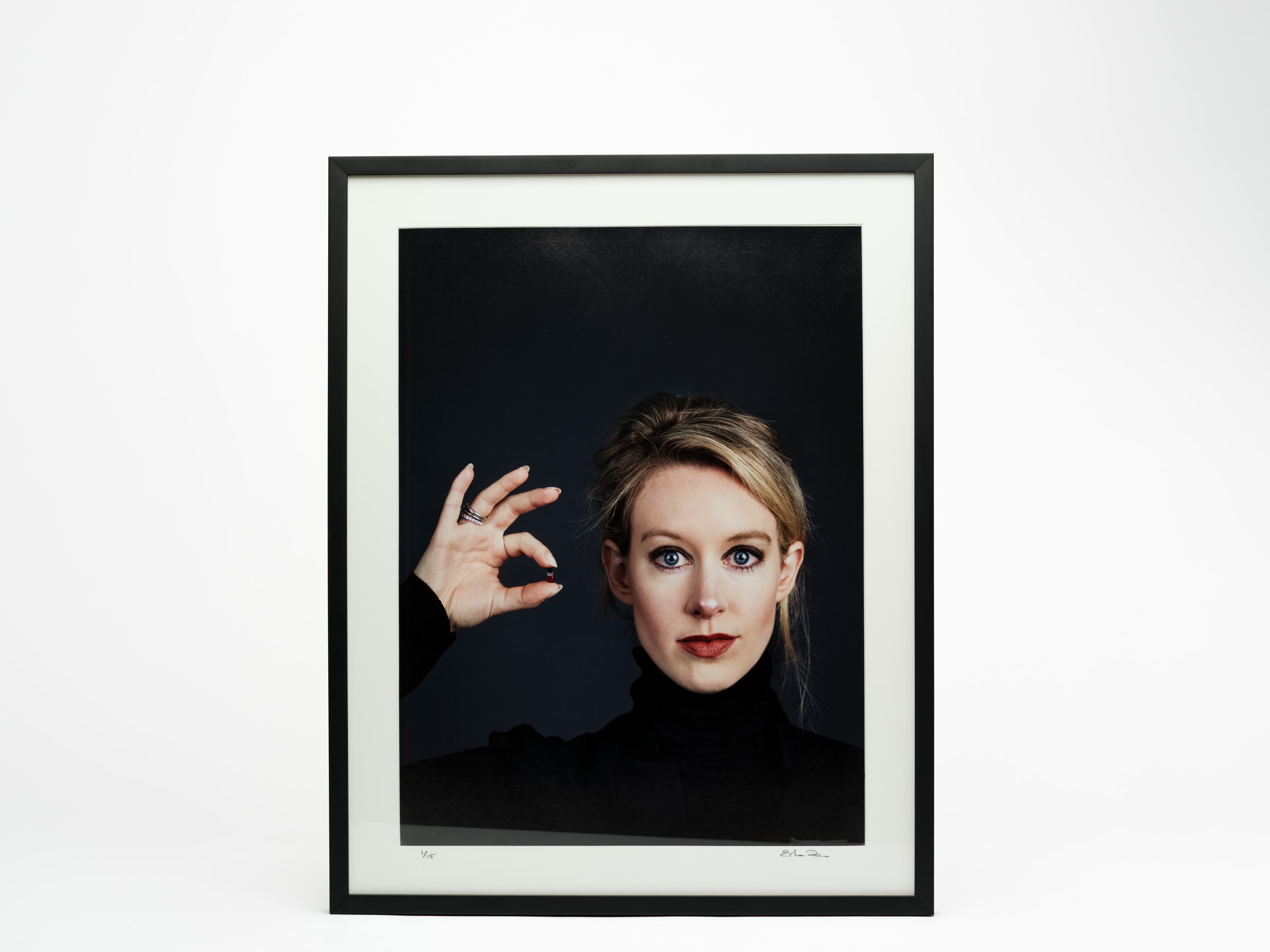 Framed portrait photograph of Elizabeth Holmes