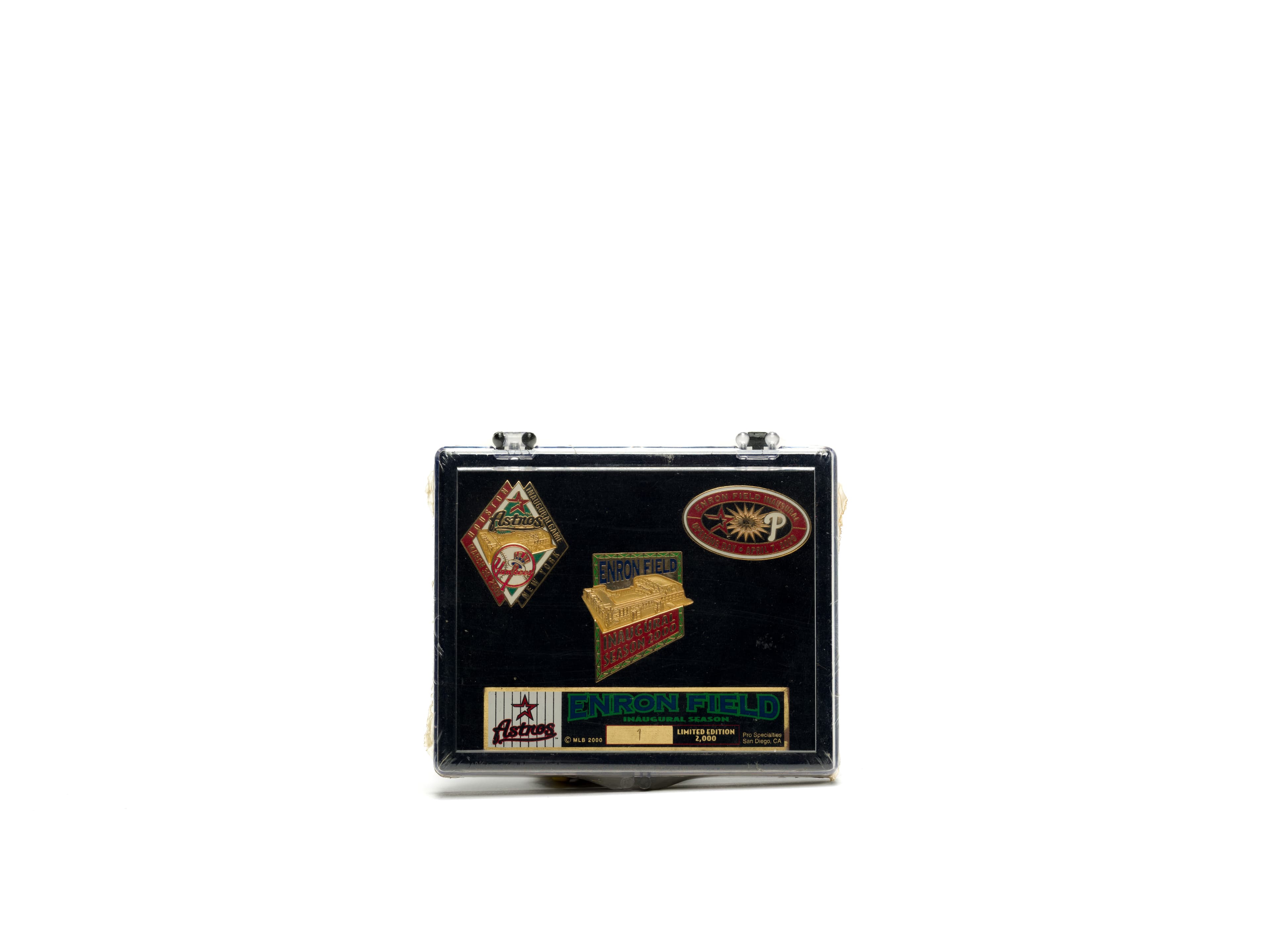 FTX-branded suitcase with stickers